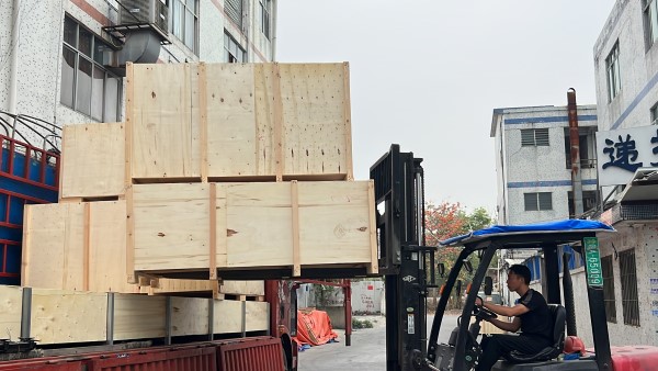 Furniture is packed in composite-board crates.